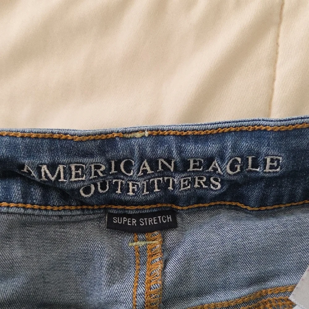 American Eagle Outfitters Ripped Blue Denim Shortie - Picture 3 of 4